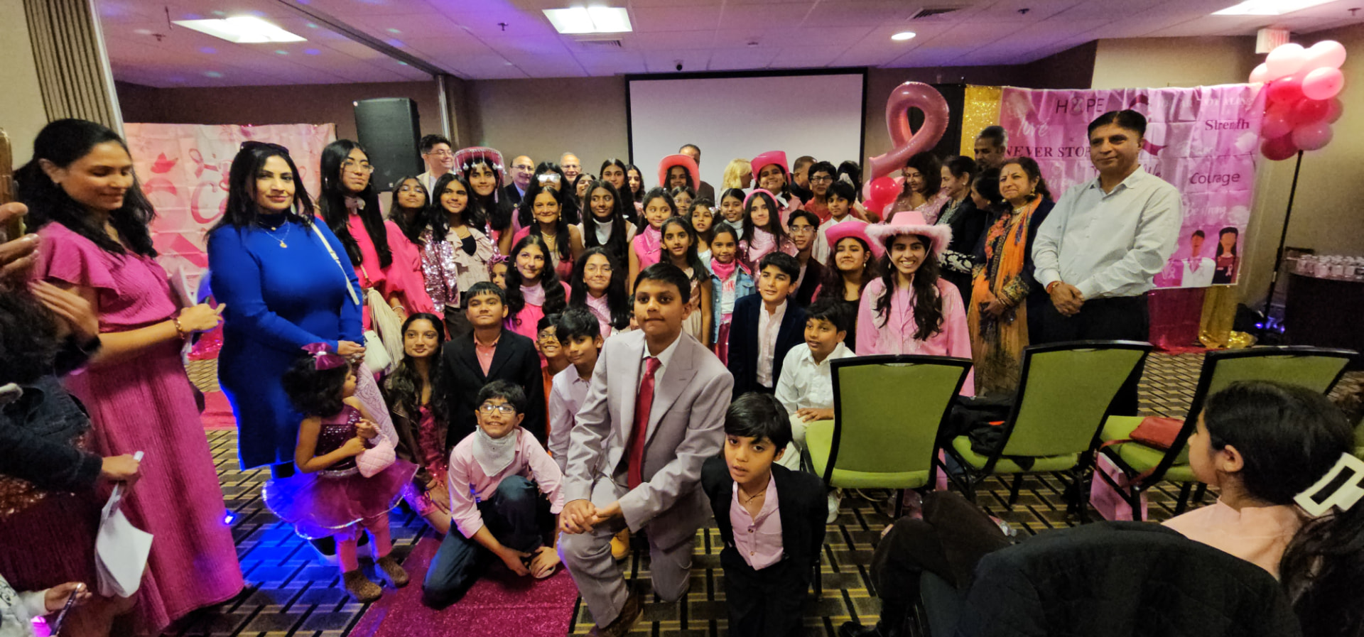 Community group photo in pink