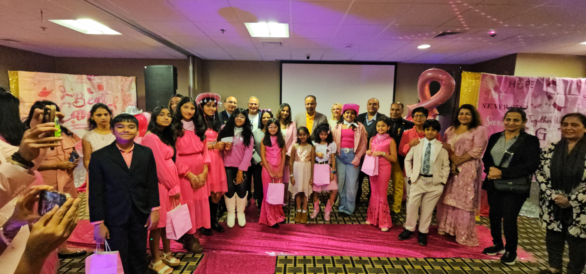 Group photo of models and organizers
